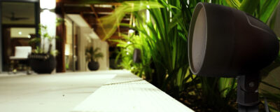 TruAudio Outdoor Audio Systems — Landscape Speakers, Kits & Burial Subs 17 UltraScape landscape satellite at dusk